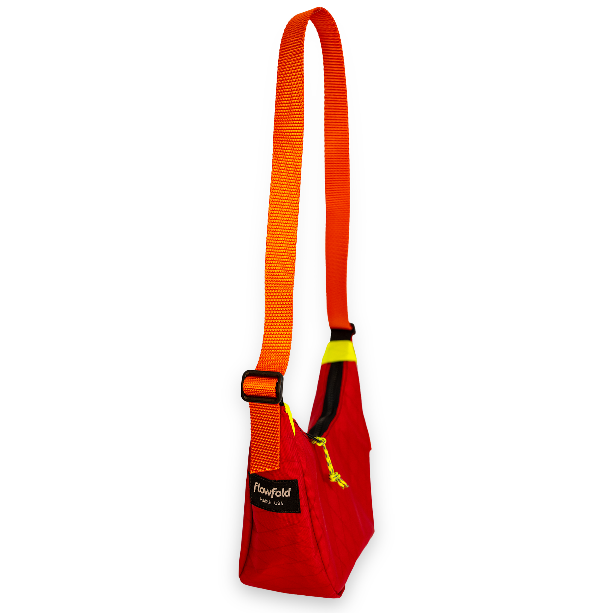 Red color blocked mini crescent shaped crossbody bag with an orange strap